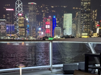 Paper Moon Restaurant in Tsim Sha Tsui, with floor-to-ceiling windows overlooking the Victoria Harbour