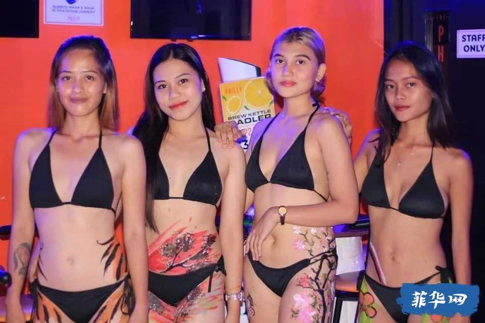 Clark/Angel City-Angel City, Philippines The girls on the stage are like prisoners with numbers but no names