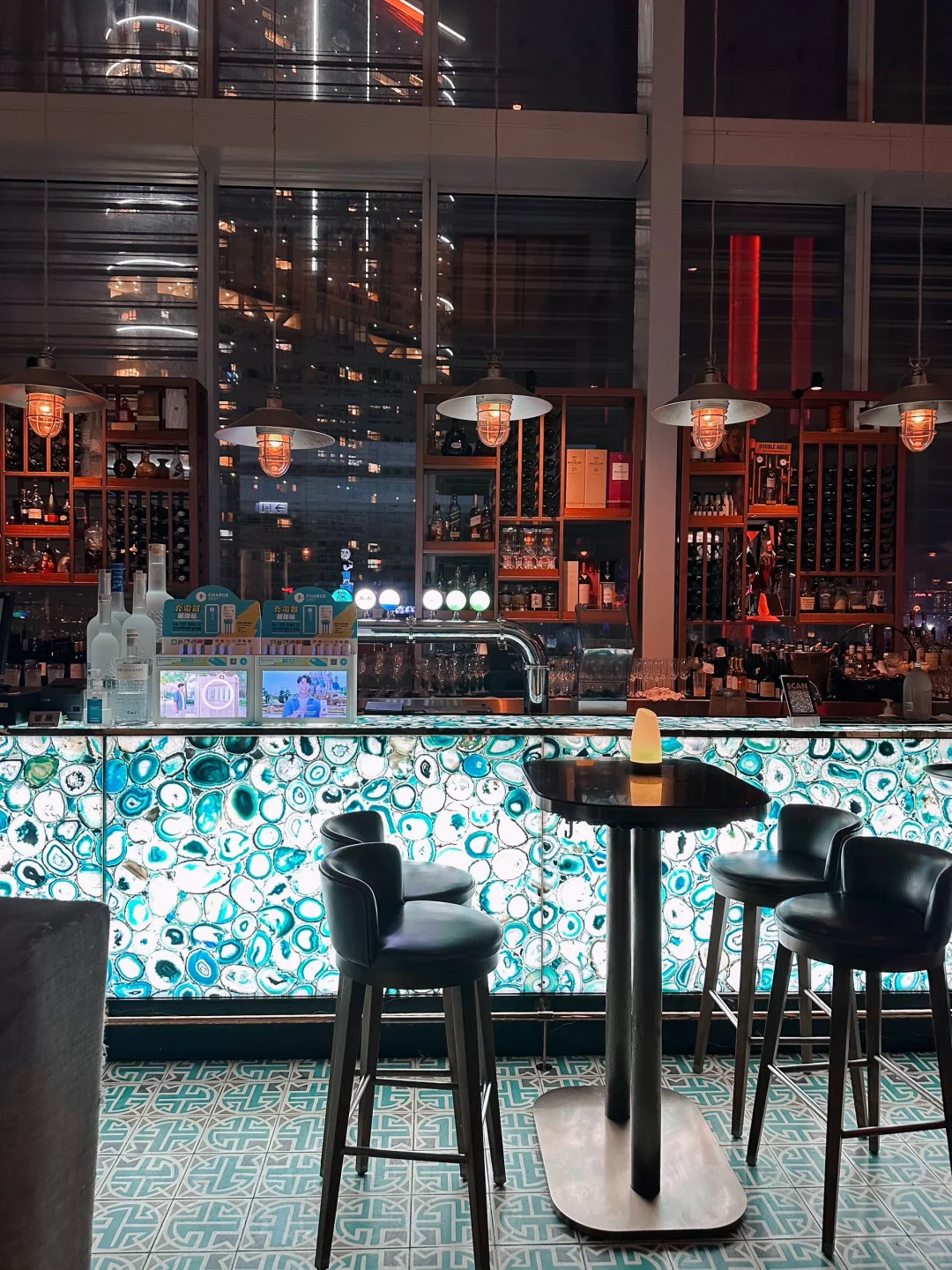 Hong kong-Eyebar, an open-air bar overlooking Victoria Harbour, offers 270-degree views of the city at night