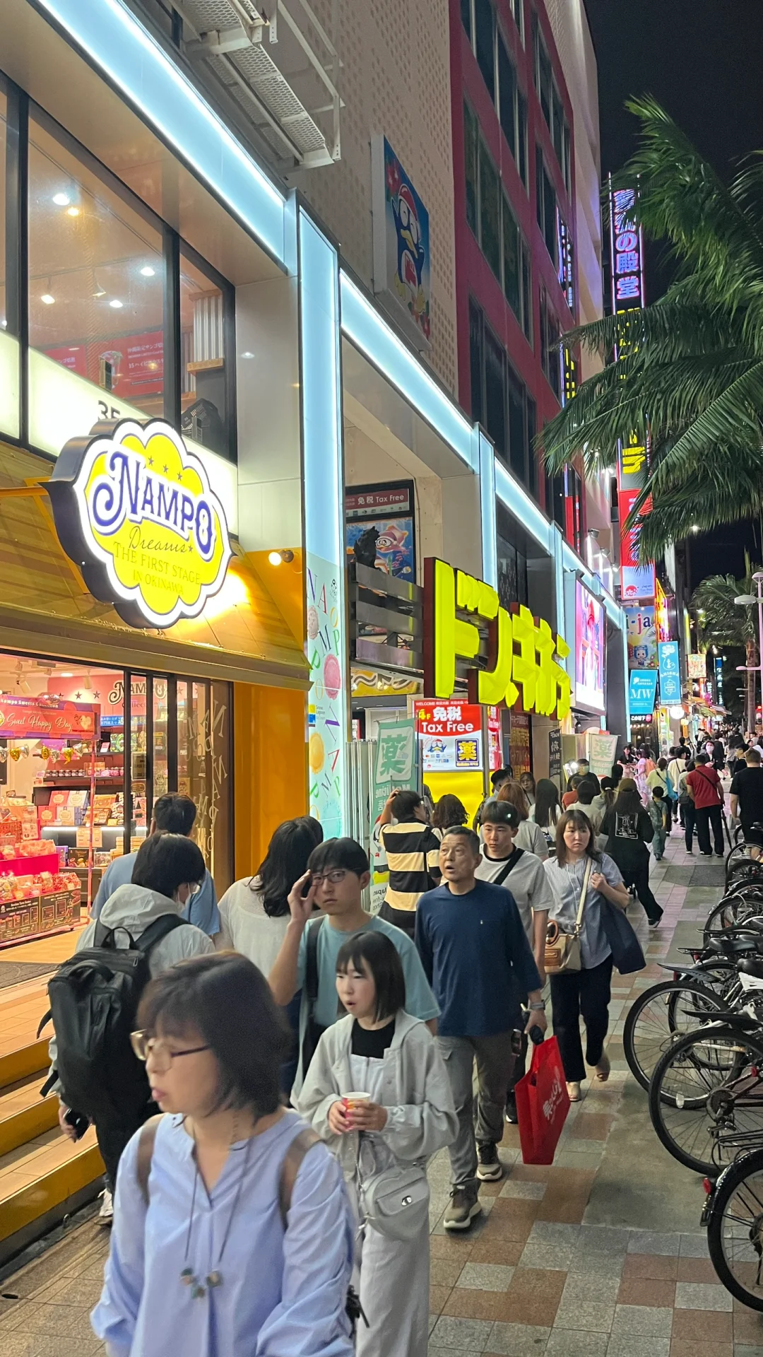 Okinawa-Kokusai-dori in the center of Naha, where you can shop and drink and enjoy live performances