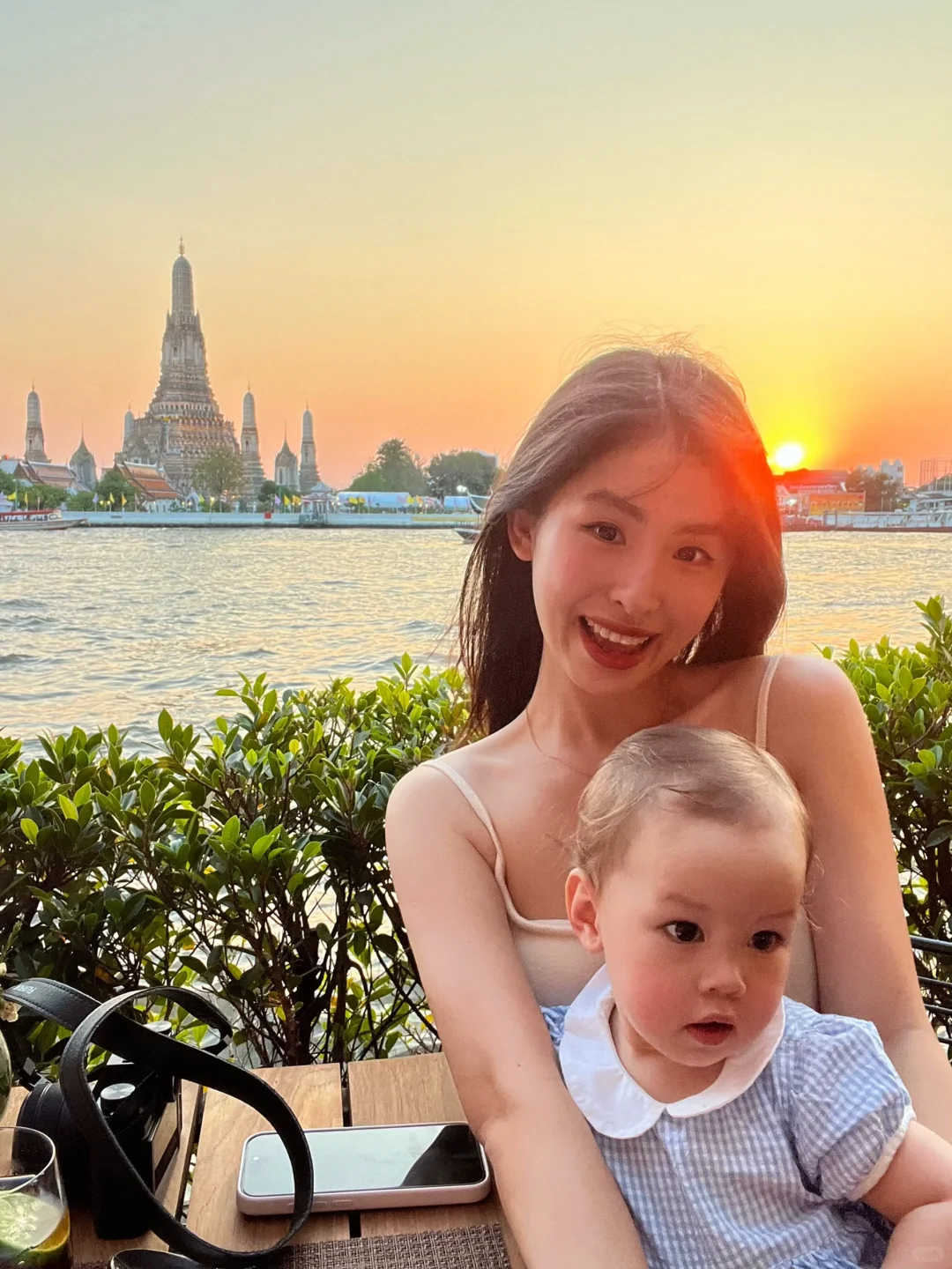 Bangkok-Chao Phraya River sunset at SALA restaurant, Wat Arun in the afterglow of the sunset