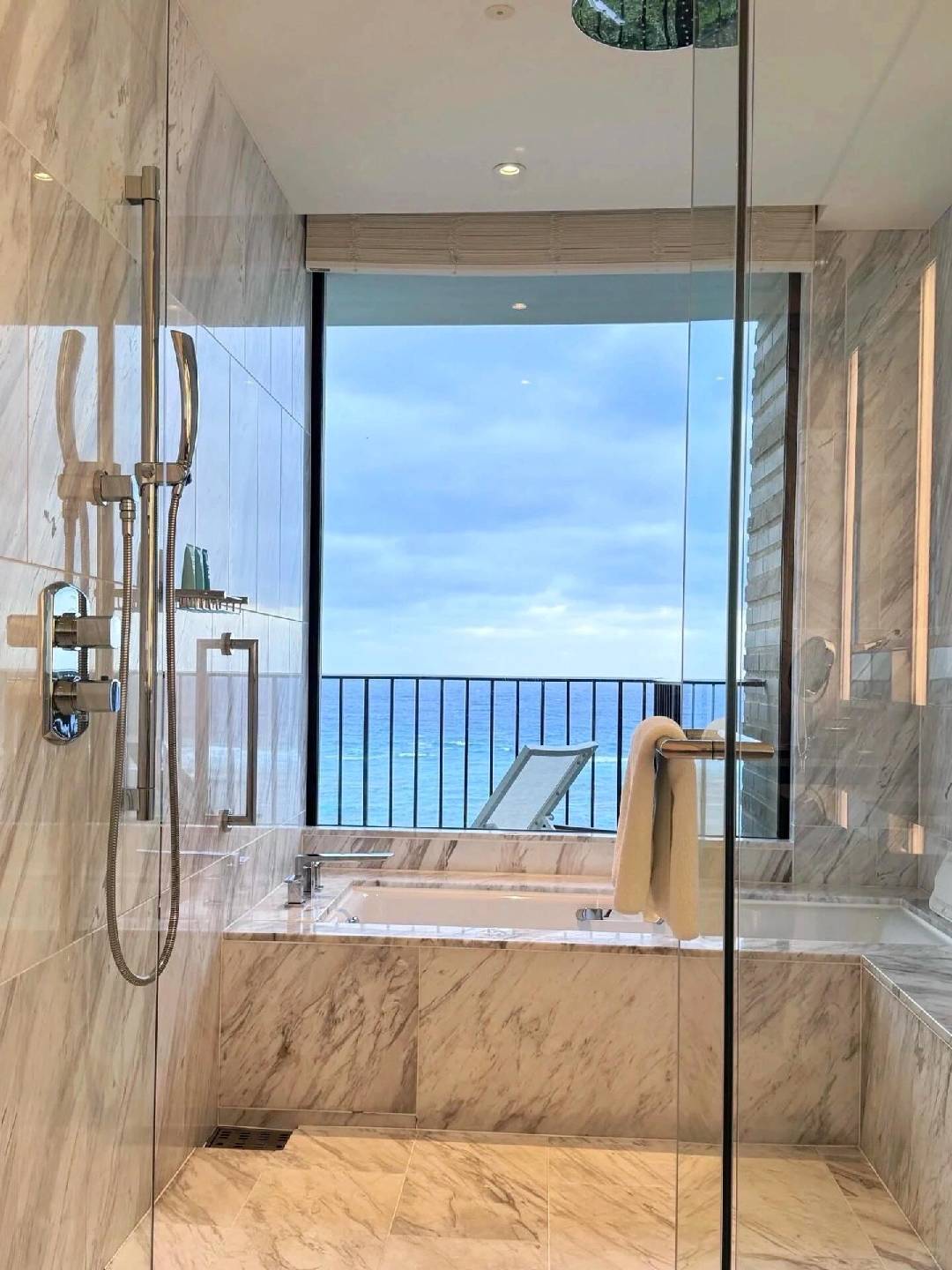 Okinawa-Halekulani Hotel in Okinawa?, surrounded by white sandy beaches and lush greenery