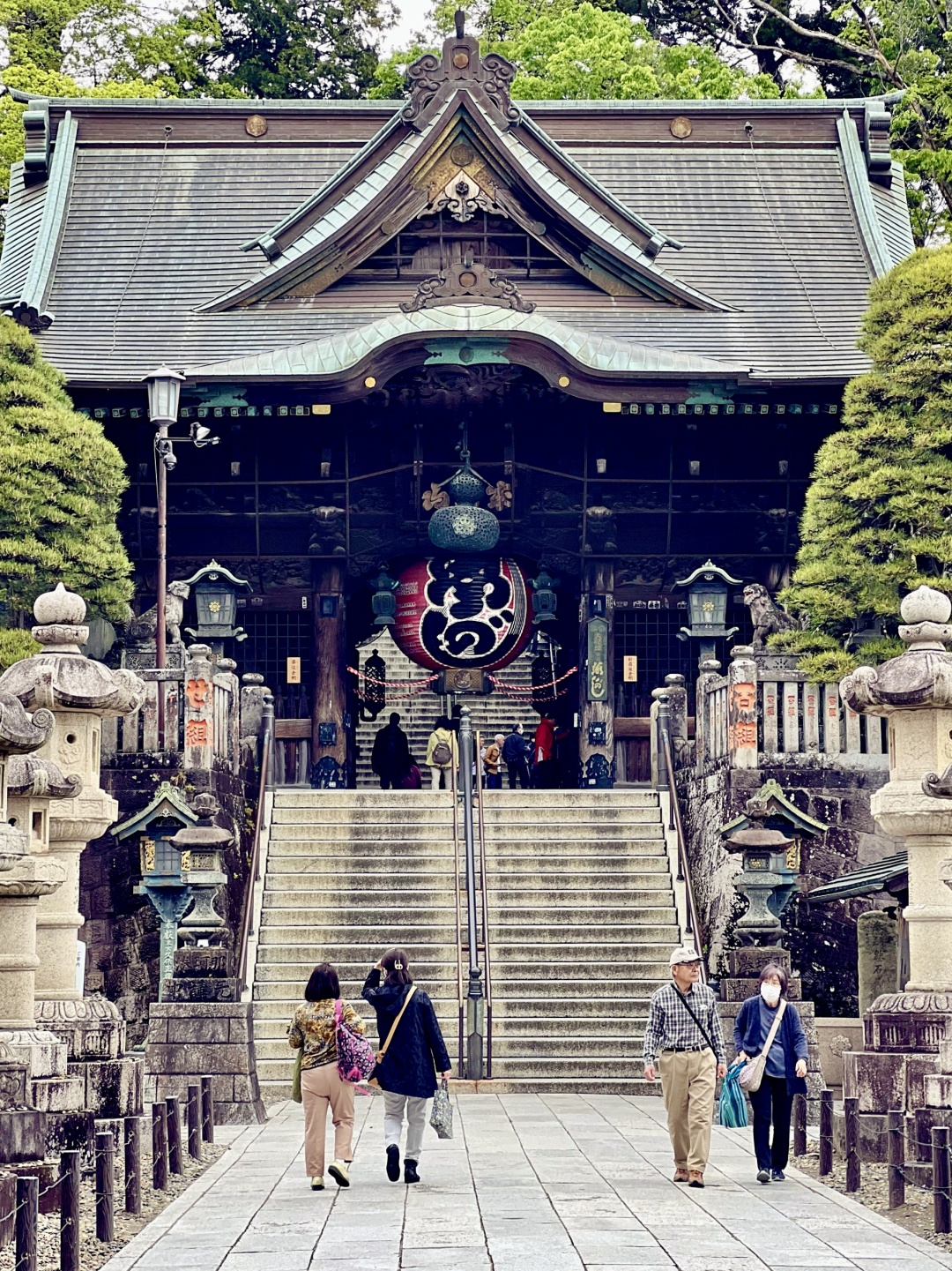 Tokyo-Tokyo Suburbs Travel Naritasan Omotesando?, an old Japanese street lined with shops