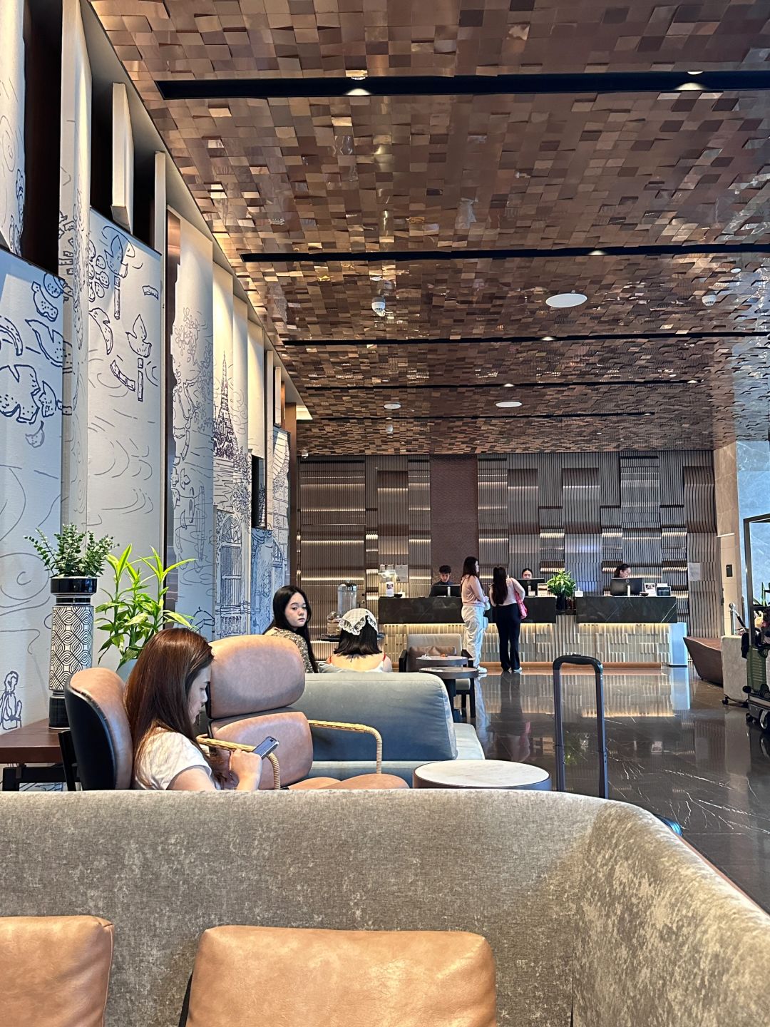 Bangkok-DusitD2 Bangkok Hotel, you can take a photo of the Pixel Building in the indoor swimming pool