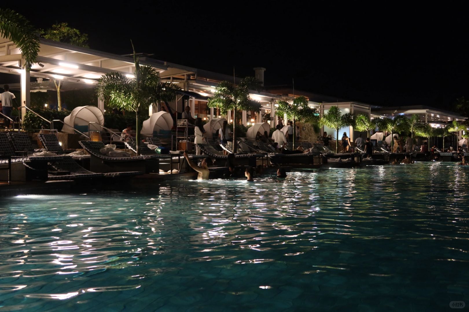 Singapore-The infinity pool on the rooftop of the Golden Sands Hotel, with views of the Gardens by the Bay and the light show
