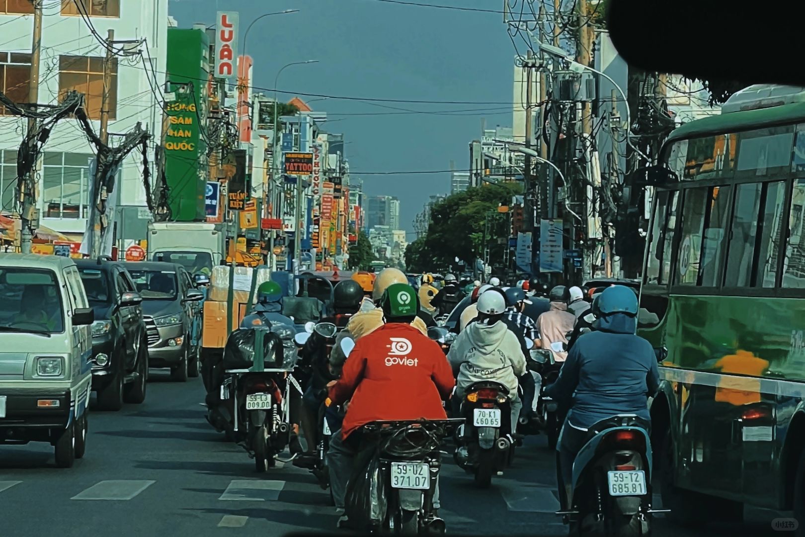 Ho Chi Minh-A short city tour of Ho Chi Minh City?, Vietnam, riding a motorcycle around the city
