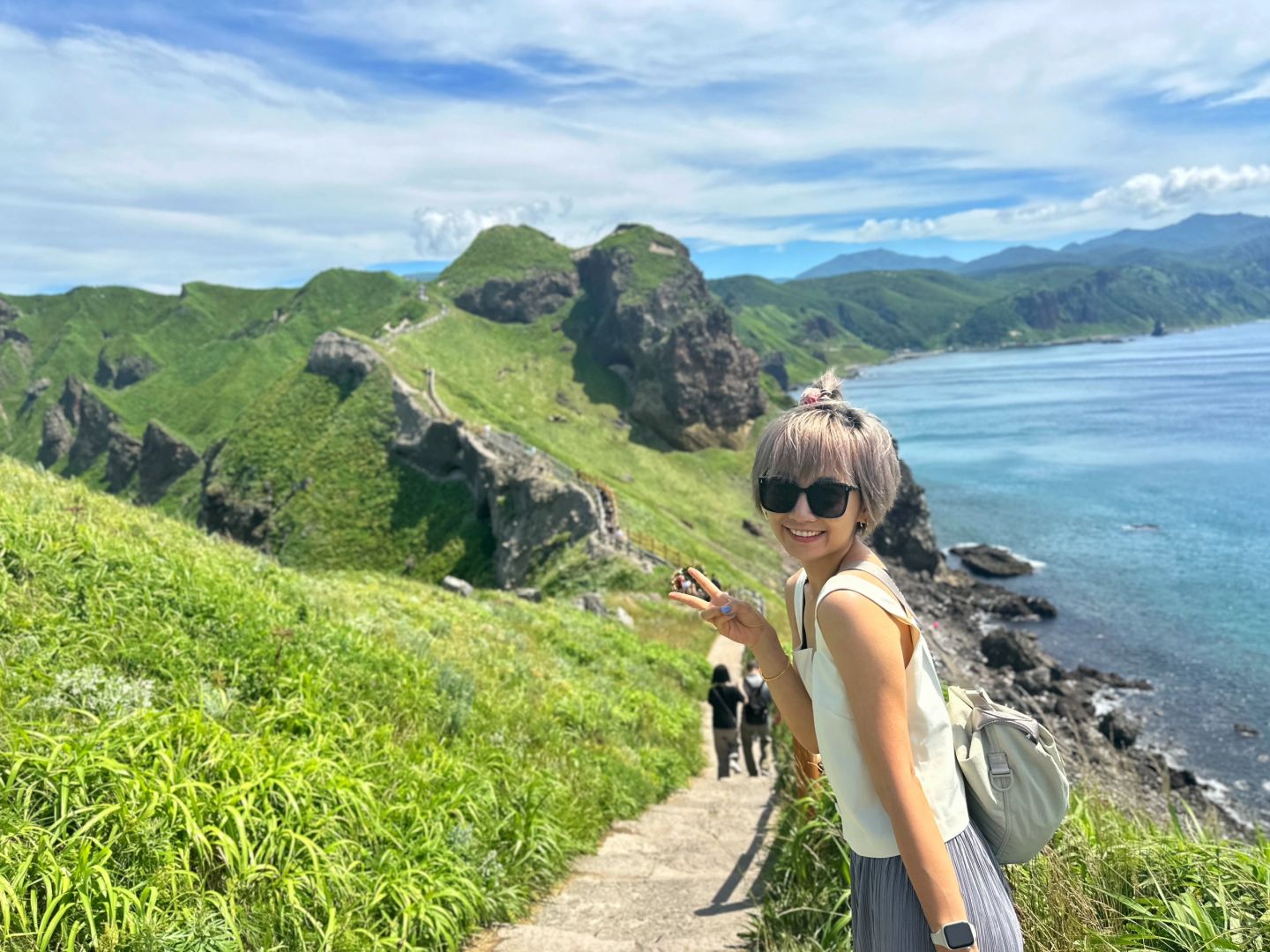 Sapporo/Hokkaido-Summer is the right way to start your trip to Hokkaido?, with green grass and blue sea