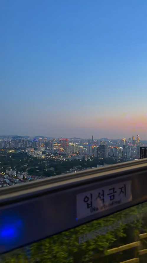 Seoul-Seoul Sunset Flyer?, the Han River in the sunset and the Seoul Tower in the distance