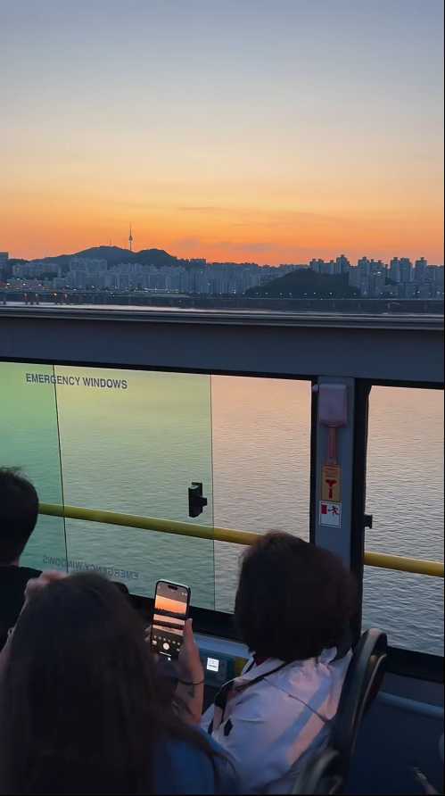Seoul-Seoul Sunset Flyer?, the Han River in the sunset and the Seoul Tower in the distance