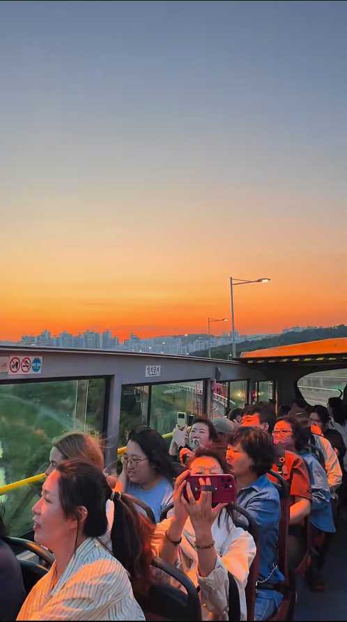 Seoul-Seoul Sunset Flyer?, the Han River in the sunset and the Seoul Tower in the distance
