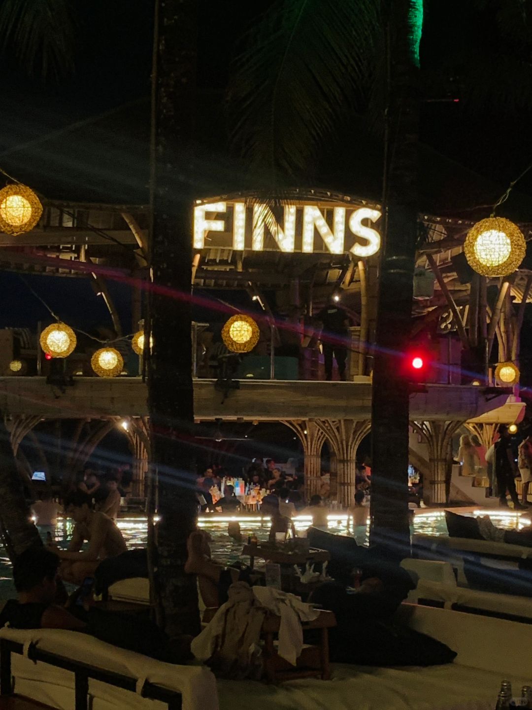 Bali-Finns beach club, a Bali themed bar with a huge swimming pool, requires reservation