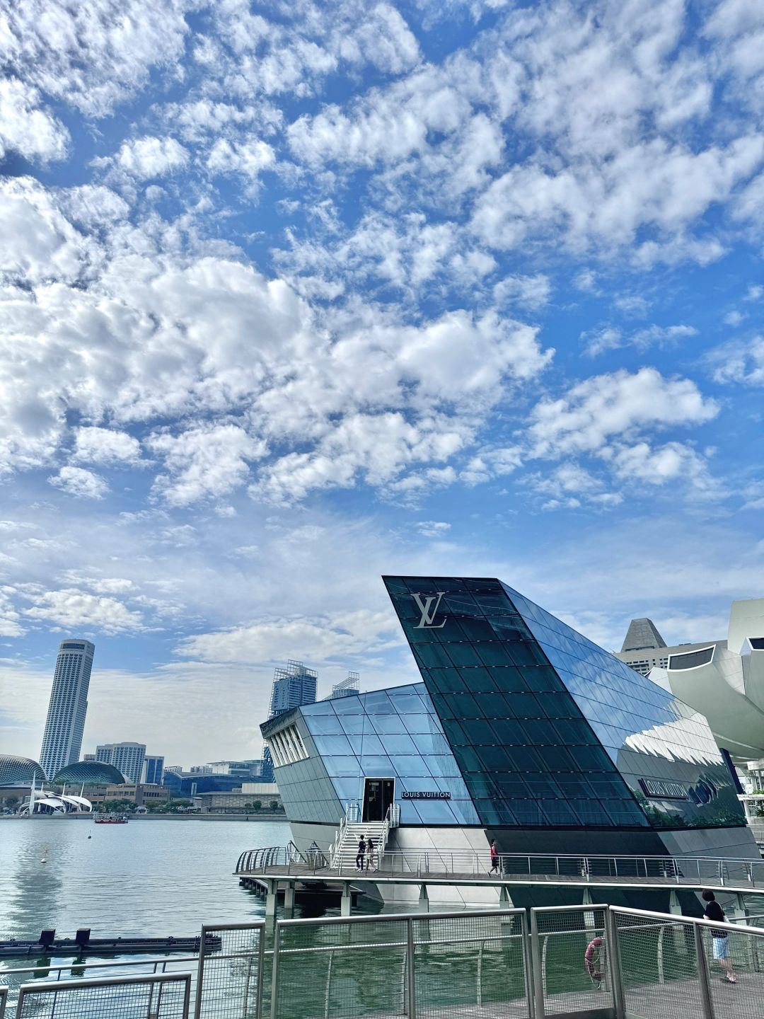 Singapore-It's beautiful here when you come out of the Sands Mall in Singapore. It was raining and now it's sunny.