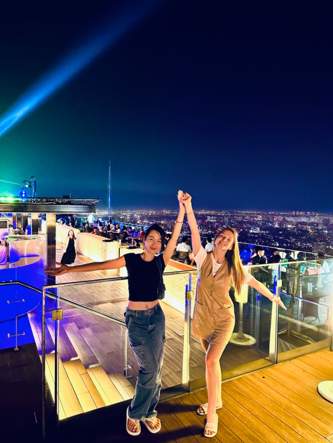 Hanoi-Top Of Hanoi Bar, the highest sky-high open-air bar in Hanoi, 2 girls drinking together