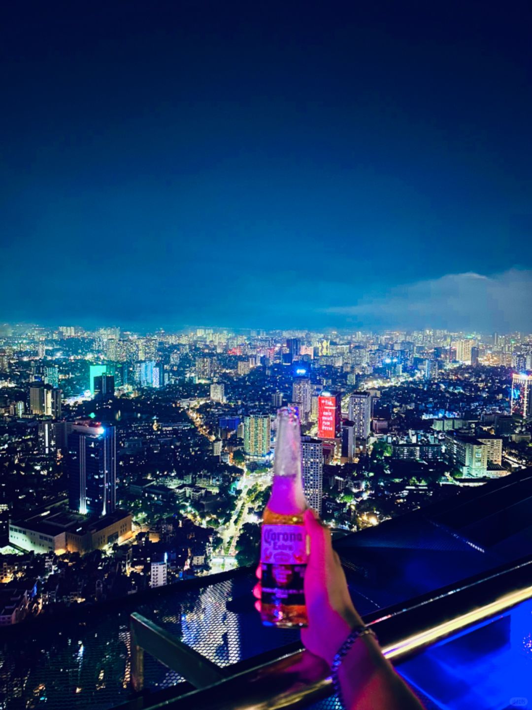 Hanoi-Top Of Hanoi Bar, the highest sky-high open-air bar in Hanoi, 2 girls drinking together