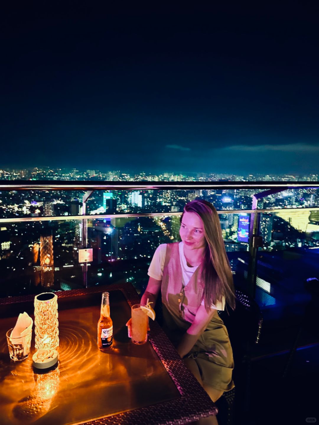Hanoi-Top Of Hanoi Bar, the highest sky-high open-air bar in Hanoi, 2 girls drinking together