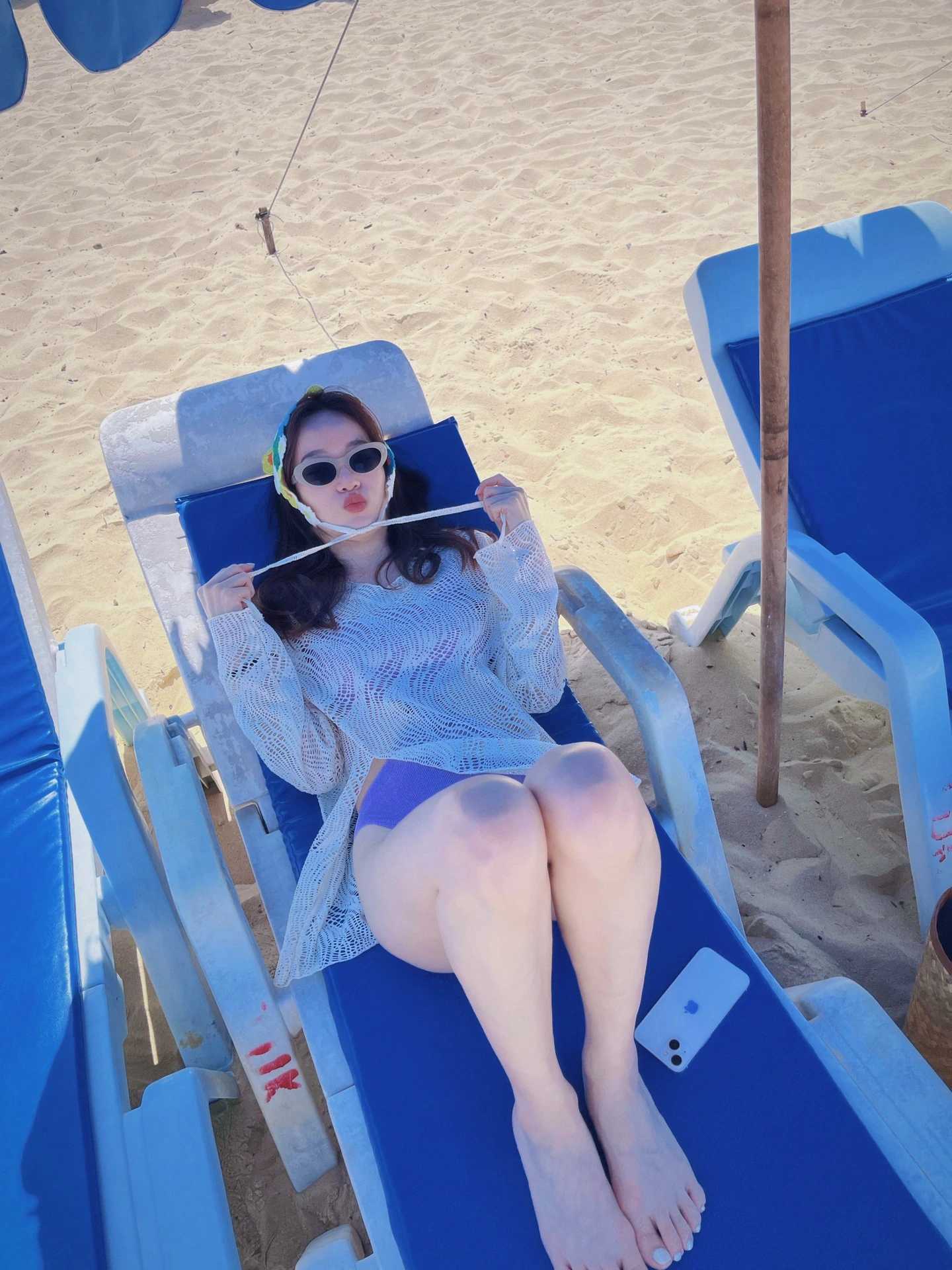 Phuket-Karon Beach in Phuket, purple swimsuits and white sand very beautiful for taking photos
