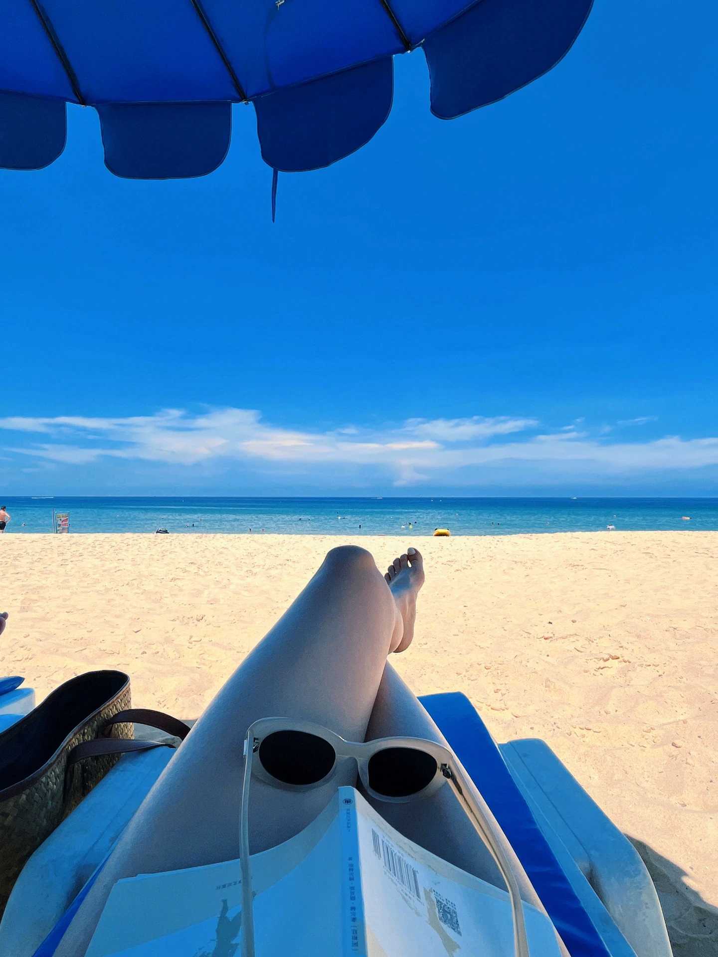 Phuket-Karon Beach in Phuket, purple swimsuits and white sand very beautiful for taking photos