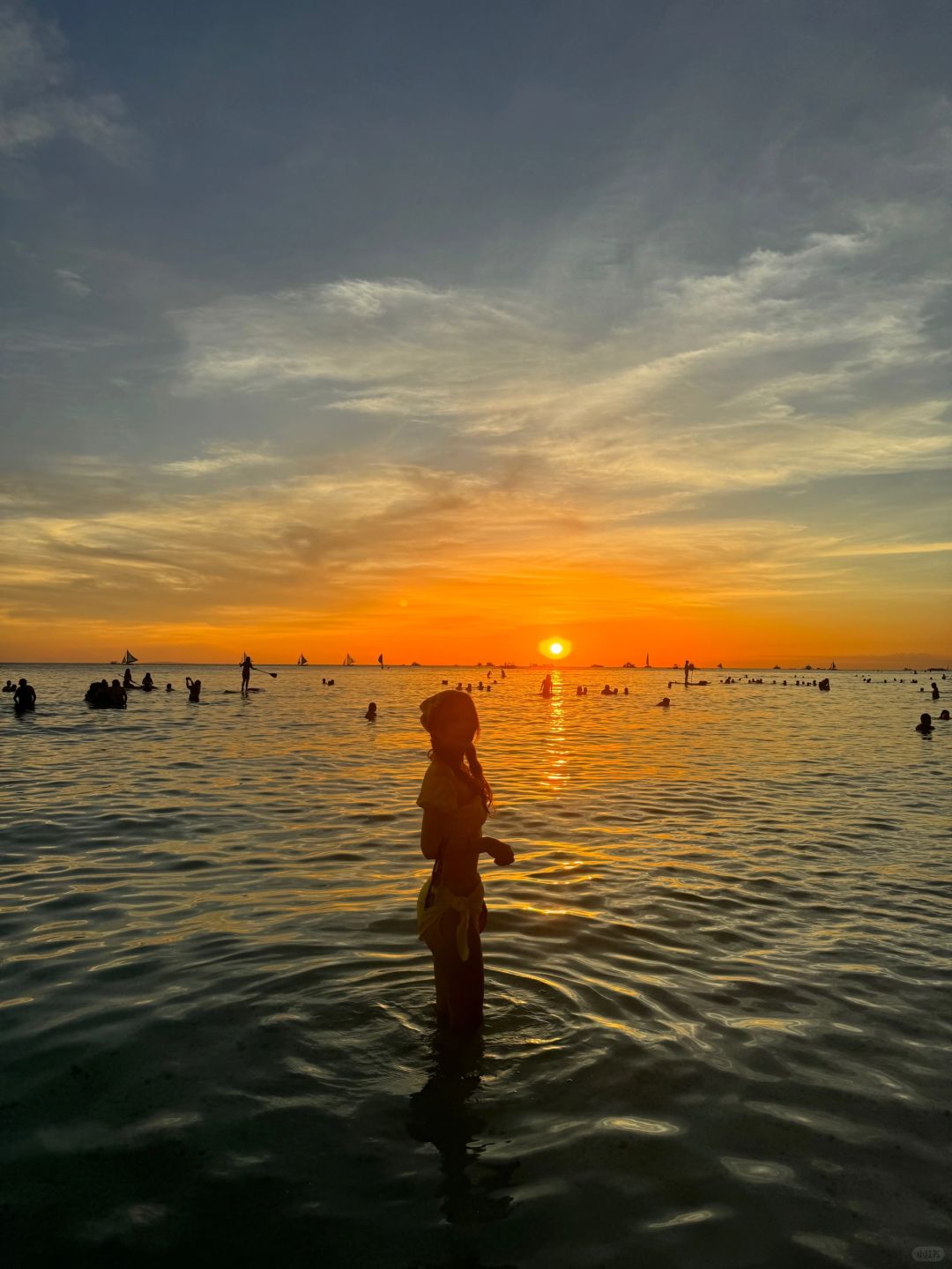 Boracay-Watching the sunset at Boracay's White Beach, ?the sky is painted orange and pink
