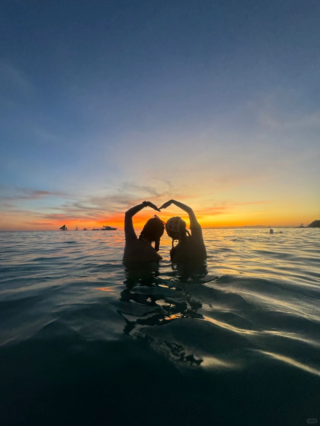 Boracay-Watching the sunset at Boracay's White Beach, ?the sky is painted orange and pink