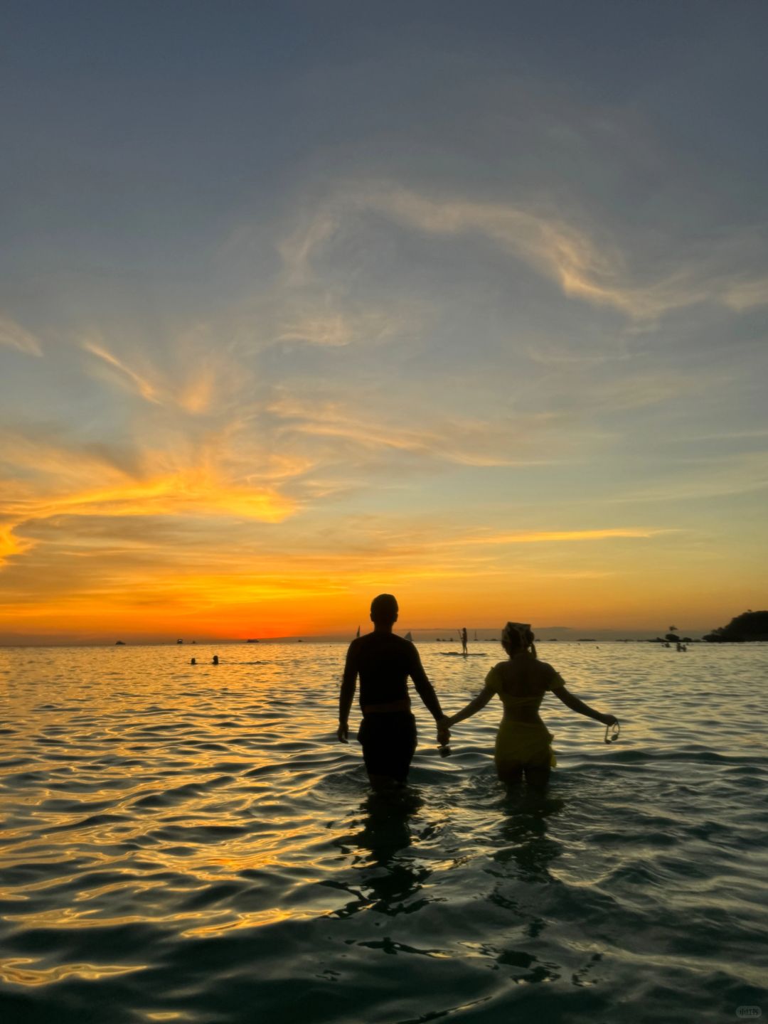 Boracay-Watching the sunset at Boracay's White Beach, ?the sky is painted orange and pink