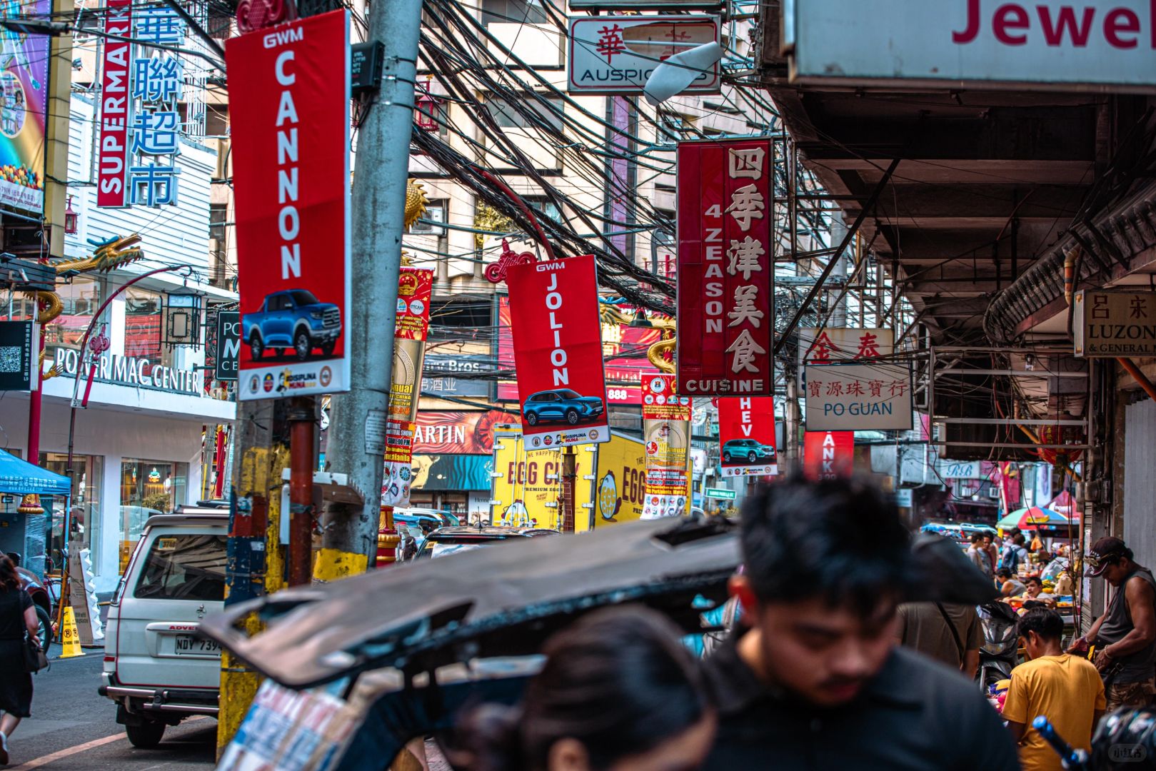 Manila/Luzon-Visiting Chinatown in Manila, Philippines. Noisy, messy, lively, crowded. Very lively