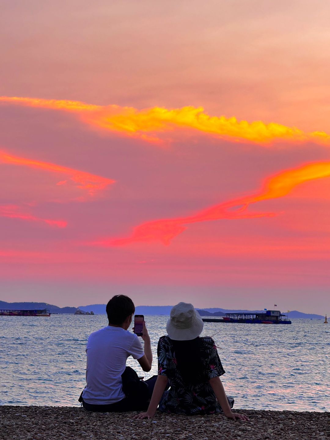 Pattaya-A person watching the beautiful sea sunset in Pattaya, impressionistic romance