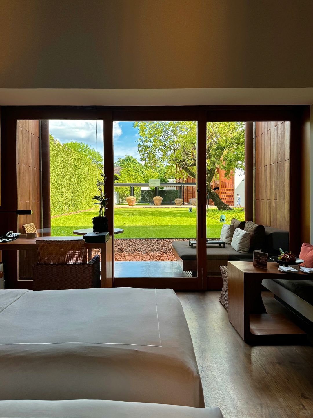 Chiang Mai-Anantara Chiang Mai Hotel Resort, designed by Kerry Hill, sunbathing and reading by the pool