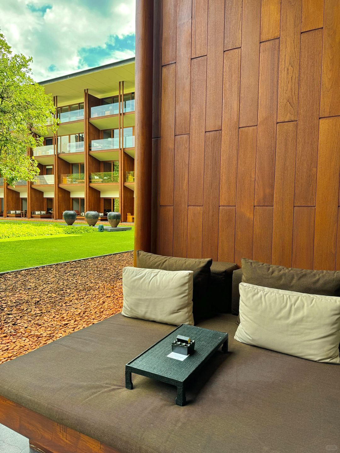 Chiang Mai-Anantara Chiang Mai Hotel Resort, designed by Kerry Hill, sunbathing and reading by the pool
