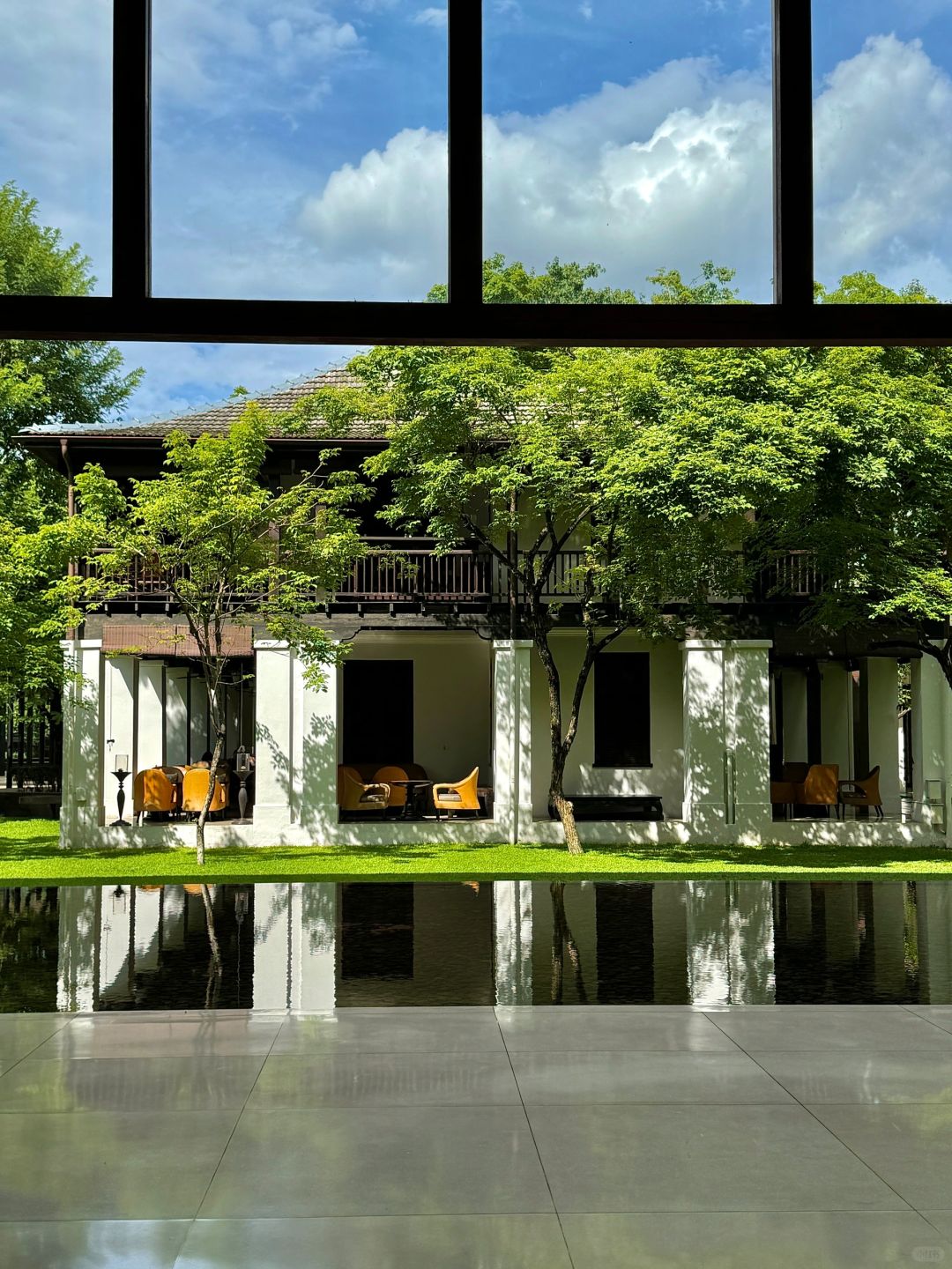 Chiang Mai-Anantara Chiang Mai Hotel Resort, designed by Kerry Hill, sunbathing and reading by the pool