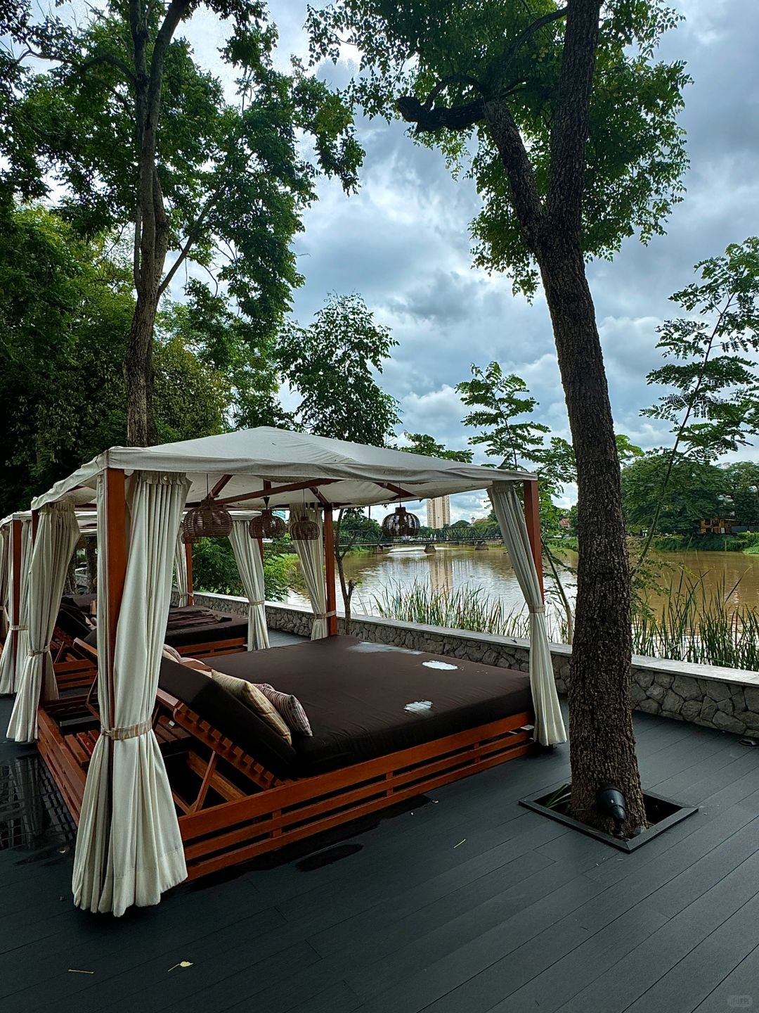 Chiang Mai-Anantara Chiang Mai Hotel Resort, designed by Kerry Hill, sunbathing and reading by the pool