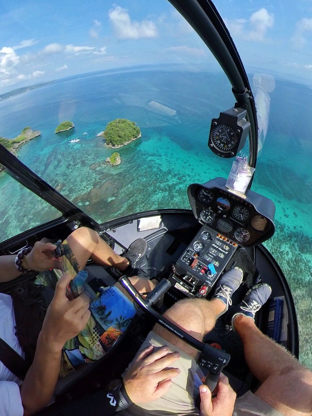 Boracay-Boracay helicopter tour around the island, ?review the white sand beach and blue water