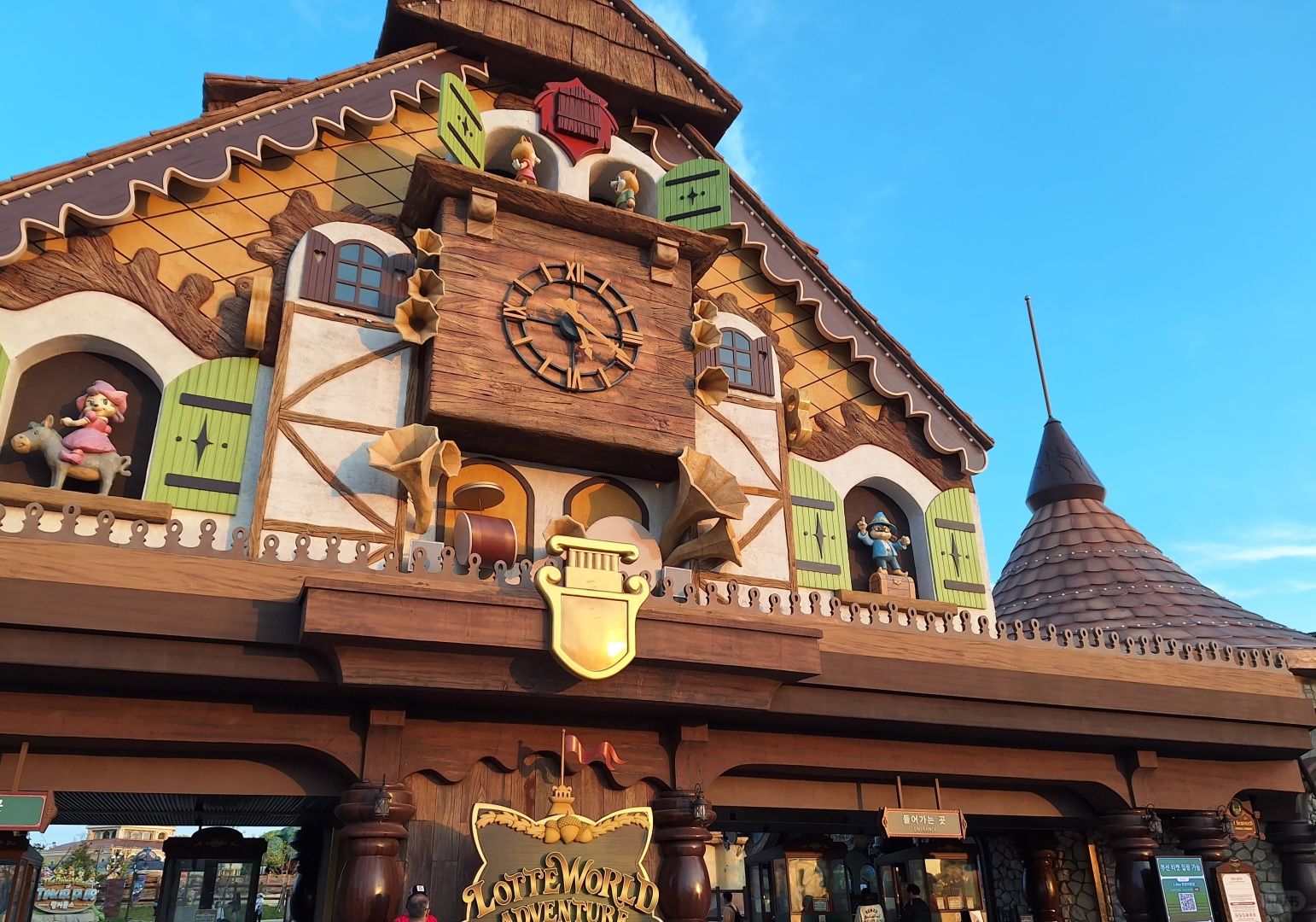 Busan/Jeju-Busan Lotte World Main Amusement Park, ?featuring carousel and roller coaster rides