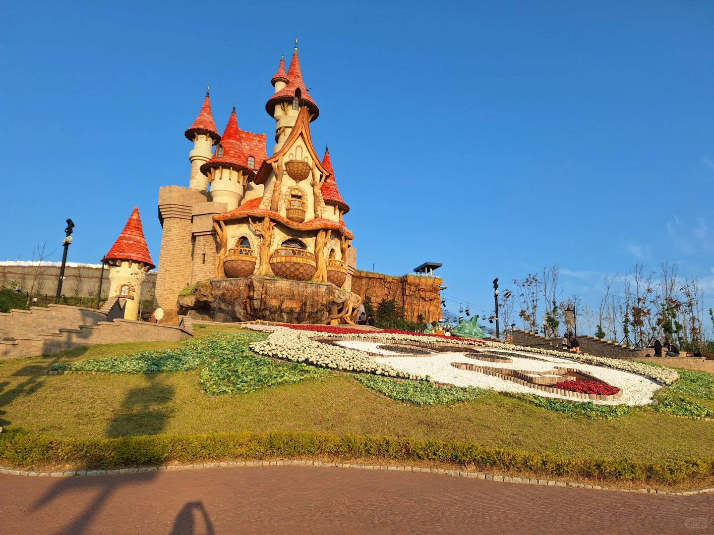 Busan/Jeju-Busan Lotte World Main Amusement Park, ?featuring carousel and roller coaster rides