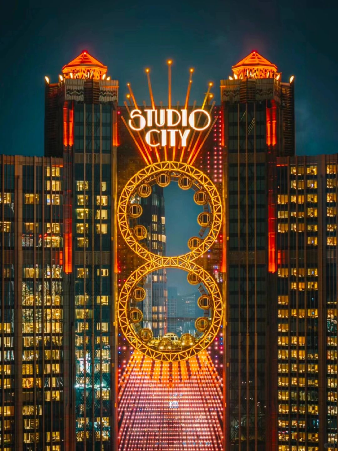 Macao-The Ferris wheel at Studio City Macau has yellow duck, Sanrio and Holle Kitty themed carriages