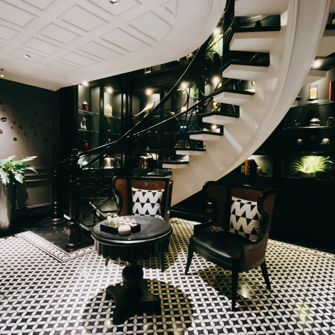 Hanoi-La Siesta Premium Hang Be Hotel, a heavy carved door,?inside the door is a dream of Southeast Asia