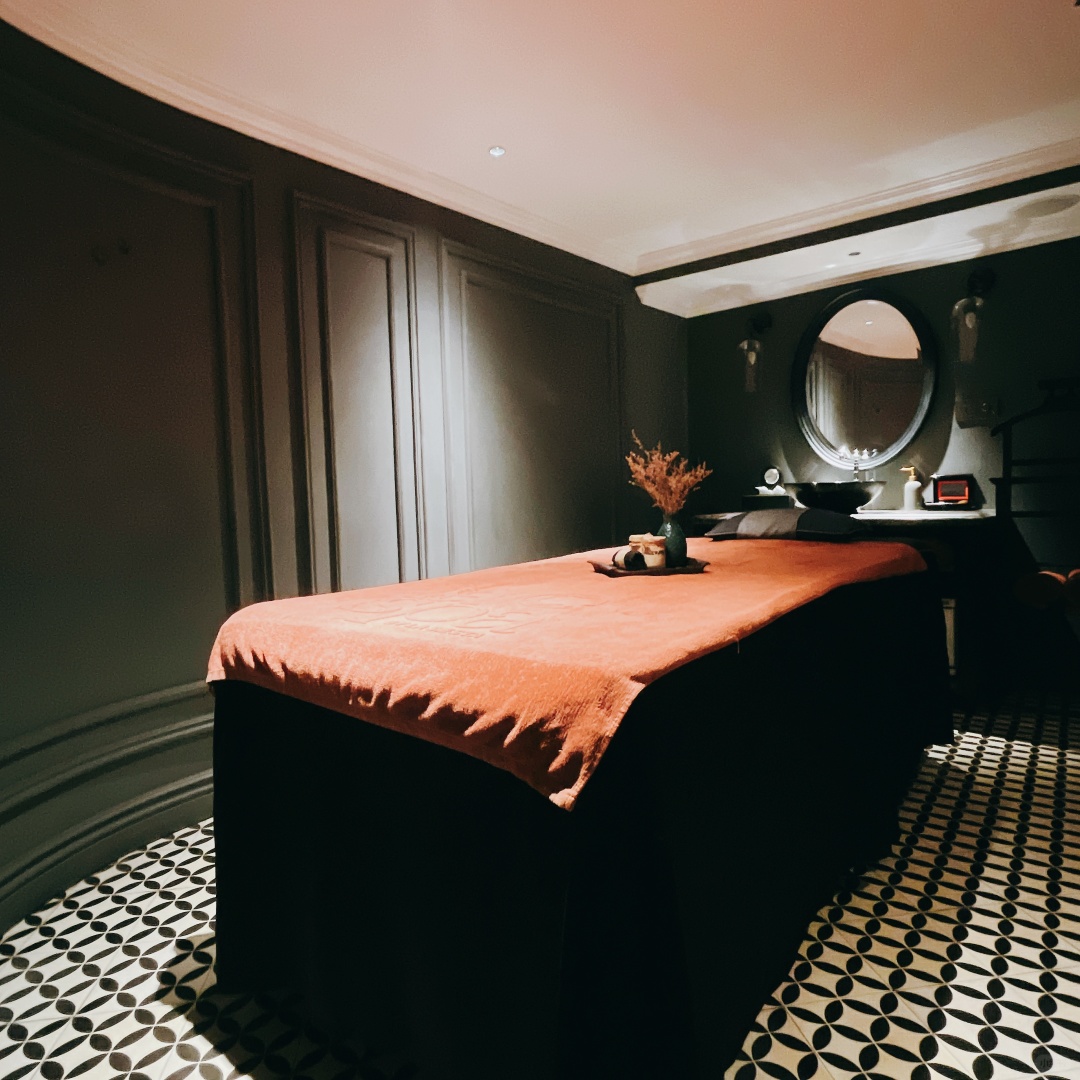 Hanoi-La Siesta Premium Hang Be Hotel, a heavy carved door,?inside the door is a dream of Southeast Asia