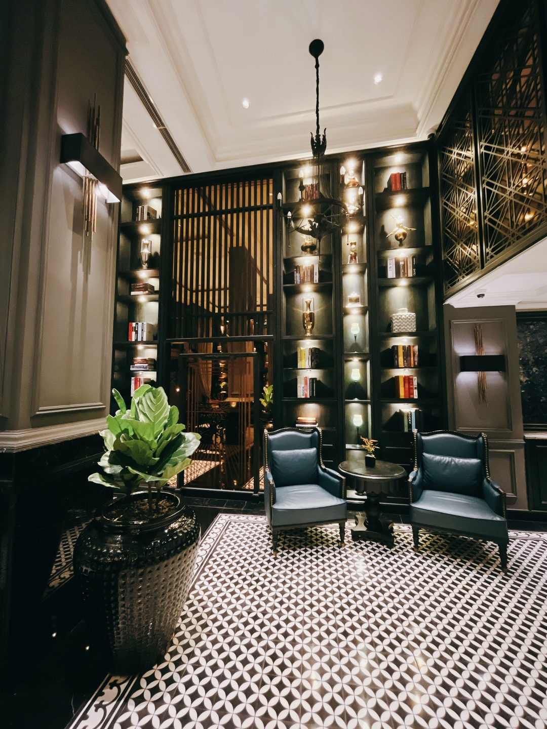 Hanoi-La Siesta Premium Hang Be Hotel, a heavy carved door,?inside the door is a dream of Southeast Asia