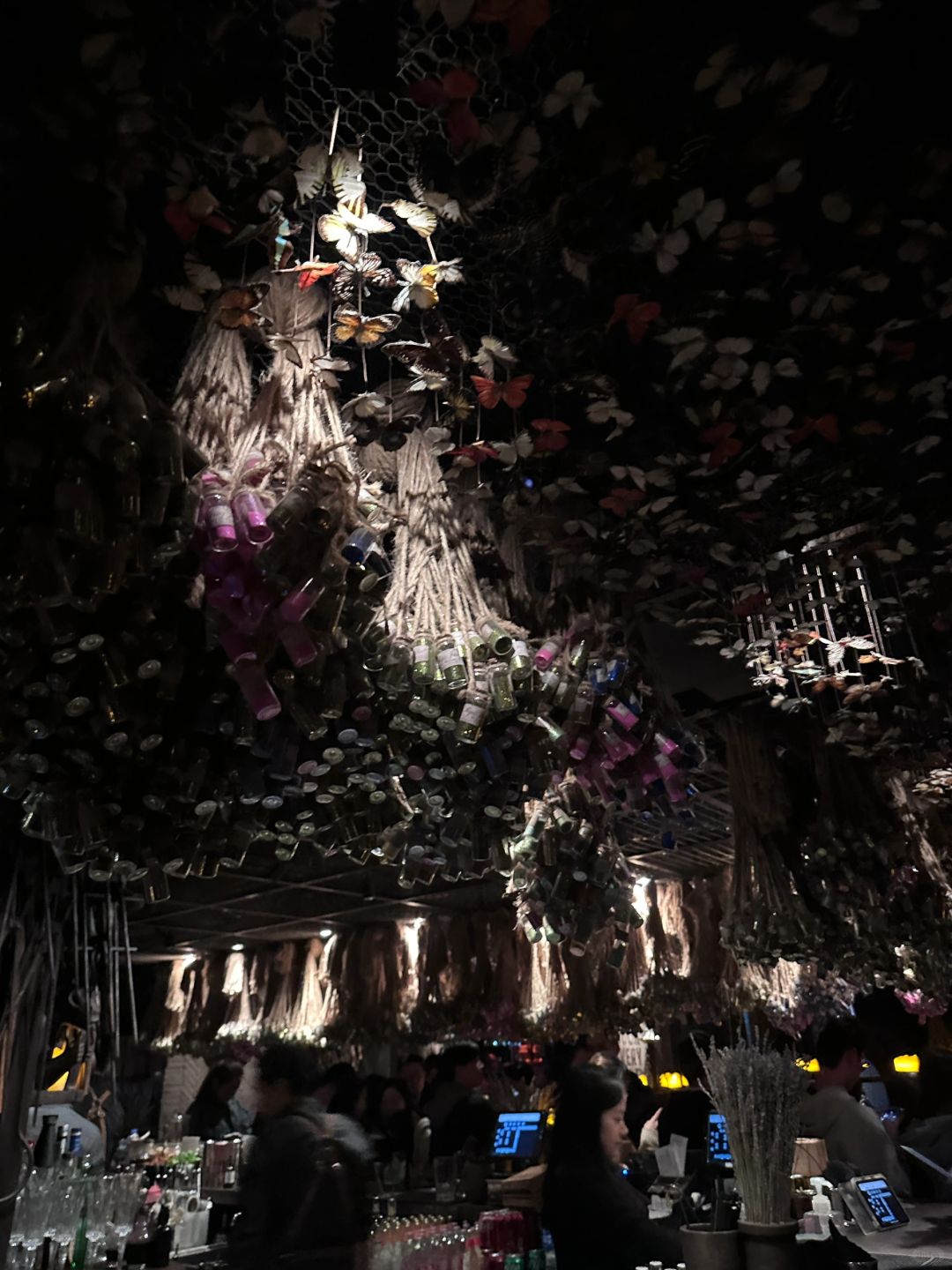 Hong kong-The Iron Fairies Bar in Hong Kong, many butterflies and wishing bottles, dancing unconsciously