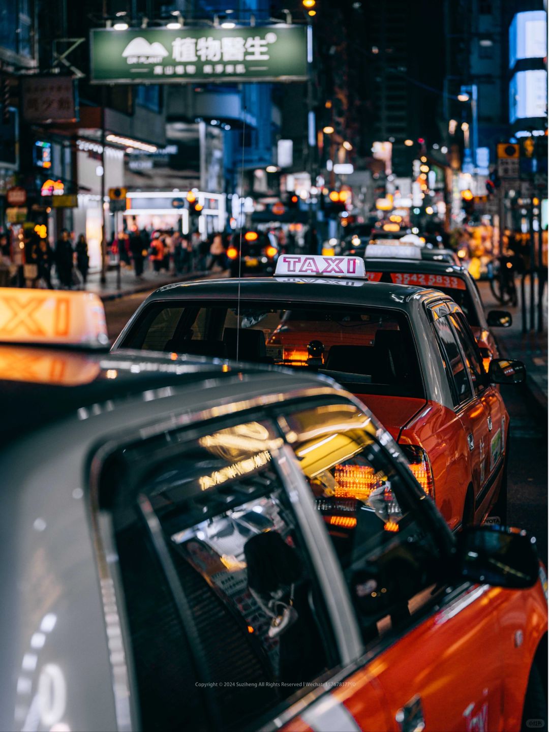 Hong kong-Neon lights and taxis on Portland Street at night, Hong Kong-style architecture and life