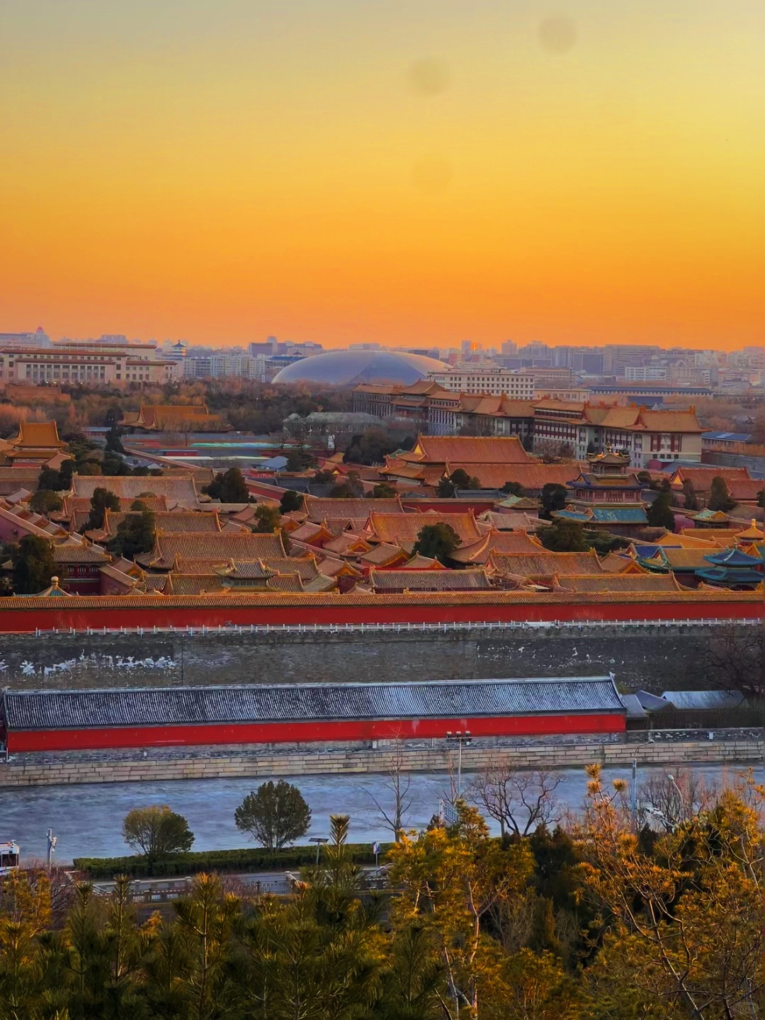 Beijing/Tianjin-When traveling to Beijing, China, don’t miss the stunning sunset at the Forbidden City.