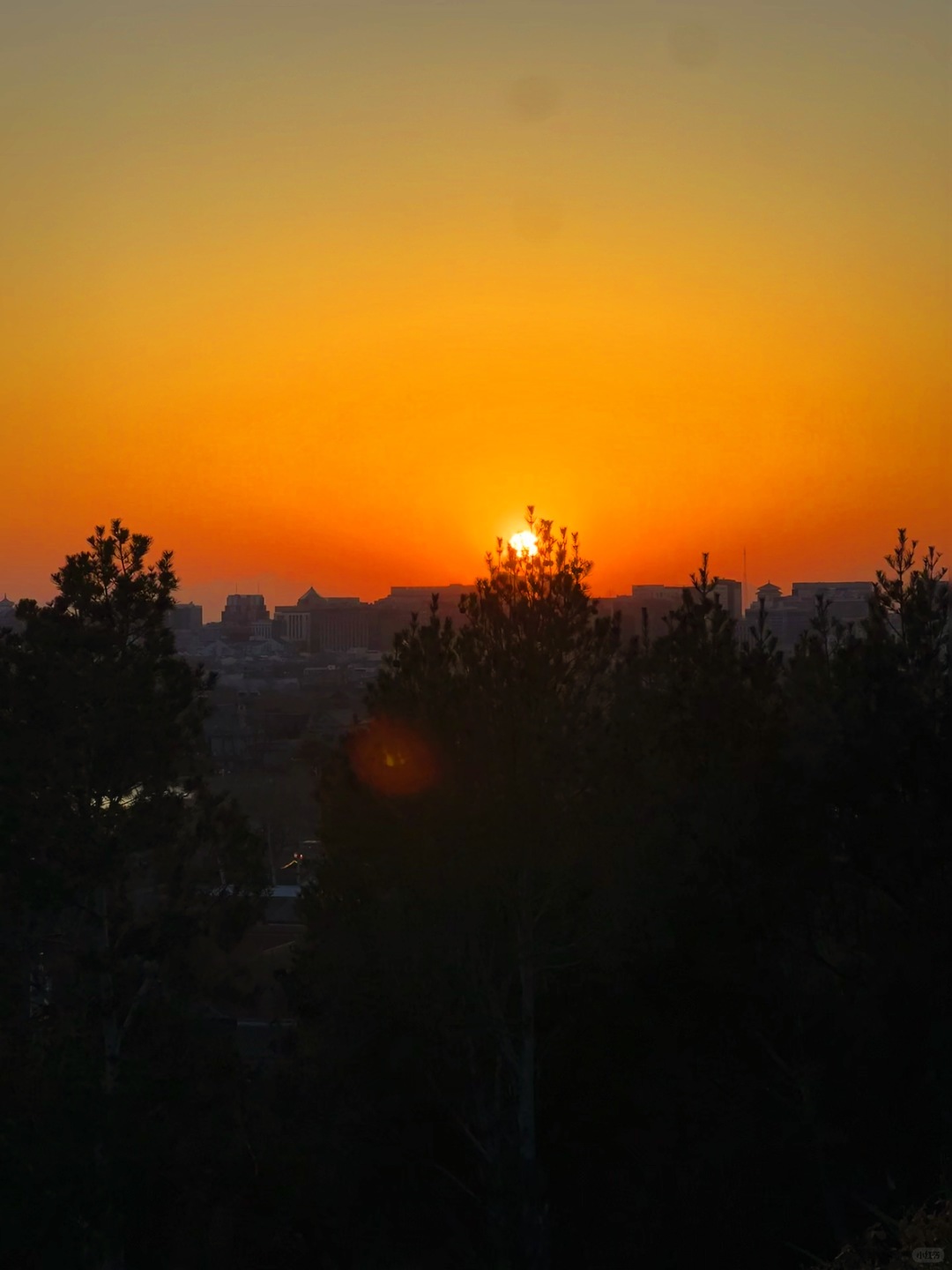 Beijing/Tianjin-When traveling to Beijing, China, don’t miss the stunning sunset at the Forbidden City.