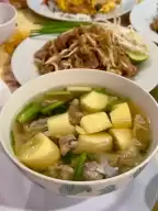 Aunt Aoy Kitchen, a Michelin restaurant on Nimman Road in Chiang Mai, signature squid rice
