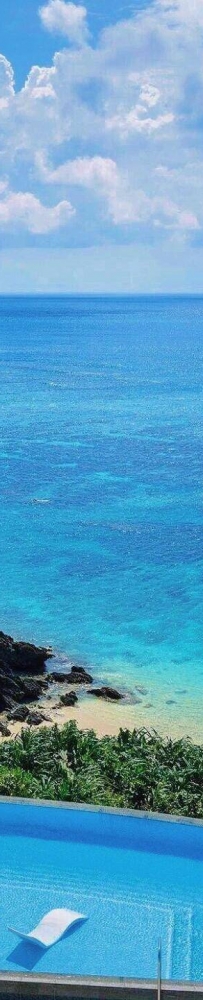 Halekulani Hotel in Okinawa?, surrounded by white sandy beaches and lush greenery