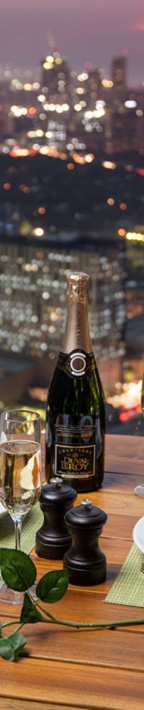Enjoy the luxury of overlooking the Manila skyline at The Peak Bar on the 62nd floor of Grand Hyatt BGC
