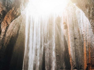 Get lost in the stunning beauty of Tukad Cepung Waterfall, where nature's magic unfolds