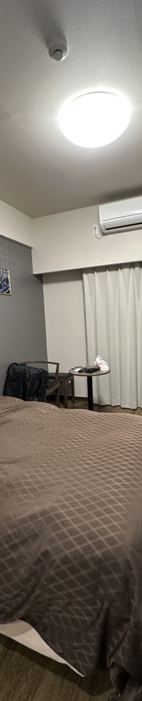 Naha Kume Kinjo LINK Hotel, the rooms are warmly colored and provide a complete set of Pola toiletries