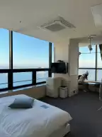 H Avenue Hotel in Busan, South Korea, open the curtains to see the sea